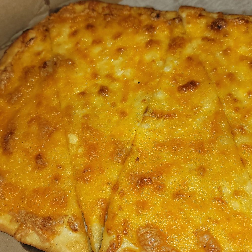 a cheese pizza in a box a cheese pizza in a box