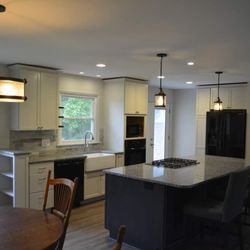 Operation Renovation - Kitchen we finished. Open concept with a beam to remove two walls.