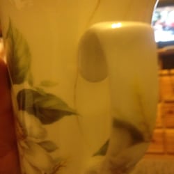 Tuesday Morning - We buy a magnolia cup and at the first use on the microwave was damage. We come from Oklahoma city and is no way for us to go ba