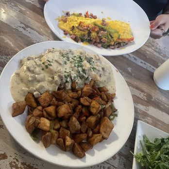 Toast Kitchen & Bar - Denver omelette with biscuits and gravy. Side of country potatoes - Breakfast & Brunch Near Me - Brea, California Toast Kitchen & Bar - Denver omelette with biscuits and gravy. Side of country potatoes - Breakfast & Brunch Near Me - Brea, California