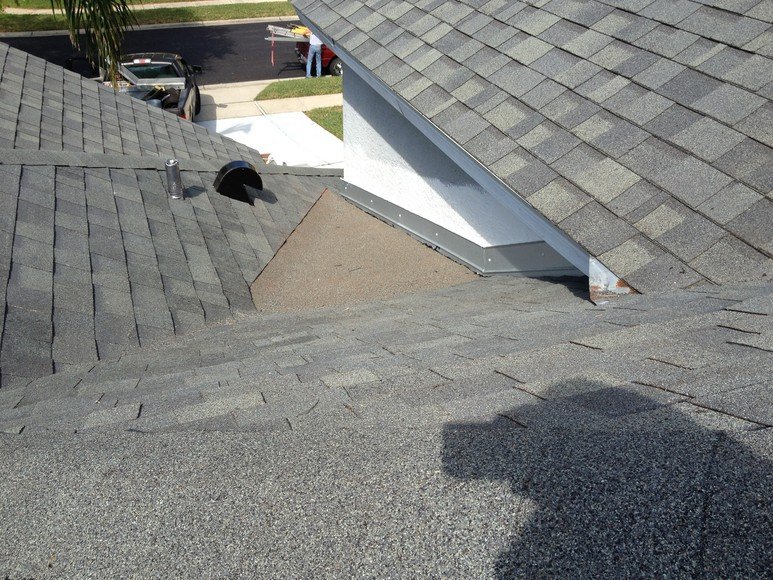 Slide of Rizzo Roofing