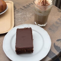 Cafe Brahe - Delicious layers of chocolate with a white-chocolate cream-topped mocha