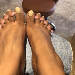 Pro Nail's - You can see the waves in the polish where he just didn't care! They sent me out without cleaning up any of the polish!