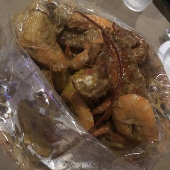 Oceanic Boil - Whole Lobster and 1 lb. Shrimp Combo with oceanic boil sauce - Cajun/Creole Near Me - Jackson Heights, New York Oceanic Boil - Whole Lobster and 1 lb. Shrimp Combo with oceanic boil sauce - Cajun/Creole Near Me - Jackson Heights, New York