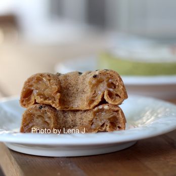 Q Bakehouse & Market - Inside of Passion Vanilla Mochi Bite ($3) - good. Soft and chewy. The flavor is more brown sugar than passion fruit, I think. - Bakeries Near Me - Ann Arbor, Michigan Q Bakehouse & Market - Inside of Passion Vanilla Mochi Bite ($3) - good. Soft and chewy. The flavor is more brown sugar than passion fruit, I think. - Bakeries Near Me - Ann Arbor, Michigan