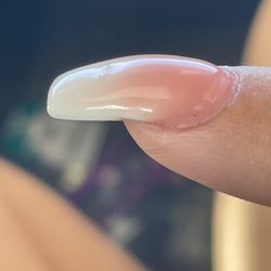 Lee Spa & Nails - Two dots poking through