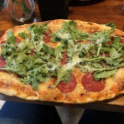 Organic Pizza - Salami with arugula.