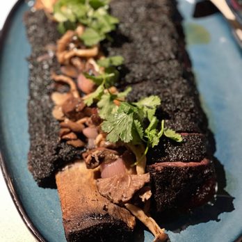 kann - SMOKED BEEF RIB haitian coffee rub, mushrooms, ti malice - Caribbean Near Me - Portland, Oregon kann - SMOKED BEEF RIB haitian coffee rub, mushrooms, ti malice - Caribbean Near Me - Portland, Oregon