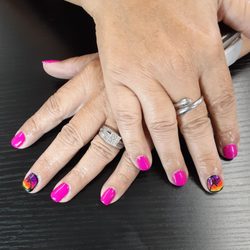 Tri County Beauty - Gel manicure with artwork.
