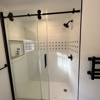 FSA Construction & Electrical - a shower with a glass door - General Contractors Near Me - Clinton, Massachusetts