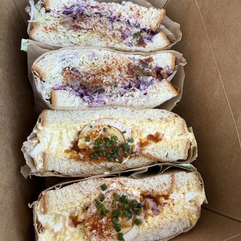 Eloise - Spicy Pork Sando with very little pork and Egg Sando with dry hard bread (notice the ends don't curve) - Sandwiches Near Me - Denver, Colorado