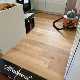 Flooring installed by Lam's Flooring for our kitchen renovation.