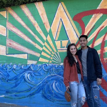 Randyland - Daughter and son-in-law in front of Randyland's part of his LA art display. - Public Art Near Me - Los Angeles, California Randyland - Daughter and son-in-law in front of Randyland's part of his LA art display. - Public Art Near Me - Los Angeles, California