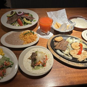 Anamia's Tex Mex - Chicken and beef fajitas. There's salad, rice, beans, and plenty of sides! Can't forget the strawberry daiquiri! - Tex-Mex Near Me - Southlake, Texas Anamia's Tex Mex - Chicken and beef fajitas. There's salad, rice, beans, and plenty of sides! Can't forget the strawberry daiquiri! - Tex-Mex Near Me - Southlake, Texas