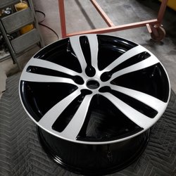Dishman Fabrications & Powder Coating - Jaguar wheels done in Metallic Silver and Gloss Black.
