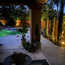 New Image Landscaping - Italian cypress with low voltage lights
