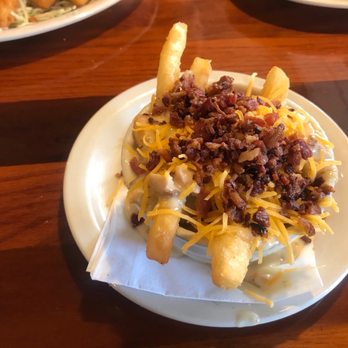 Sunset Grille - Chowder Fries with bacon. - Seafood Near Me - Saint Augustine, Florida Sunset Grille - Chowder Fries with bacon. - Seafood Near Me - Saint Augustine, Florida
