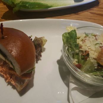 Original Joe's Restaurant & Bar - half salmon burger with cesar salad - Bars Near Me - Edmonton, Alberta Original Joe's Restaurant & Bar - half salmon burger with cesar salad - Bars Near Me - Edmonton, Alberta