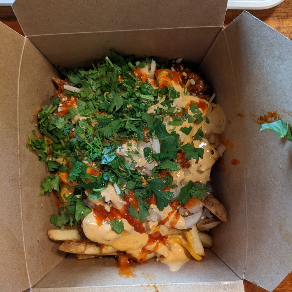 Chi'Lantro - Kimchi fries with spicy pork - Korean Near Me - Austin, Texas Chi'Lantro - Kimchi fries with spicy pork - Korean Near Me - Austin, Texas