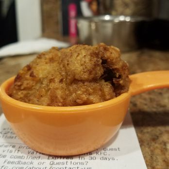 KFC - 1 wing in a 1/4 measuring cup. - Chicken Wings Near Me - Old Bridge, New Jersey