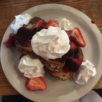Strawberry Place - Hydrangea challah French toast, with a cinnamon coat and blueberry sauce, and stuffed with peaches. - Breakfast & Brunch Near Me - Nyack, New York