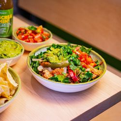 California Tortilla - Meet your favorite kind of sunset - served in a bowl  Fresh veggies, avocado, and a little spice.