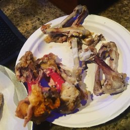 Blood soaked chicken bone. I think it's called the 9th Ave Special chicken wings for $15 Blood soaked chicken bone. I think it's called the 9th Ave Special chicken wings for $15