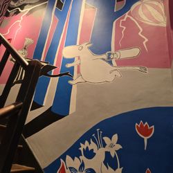 The Moomin Shop - Murals along the stairs to get to the store
