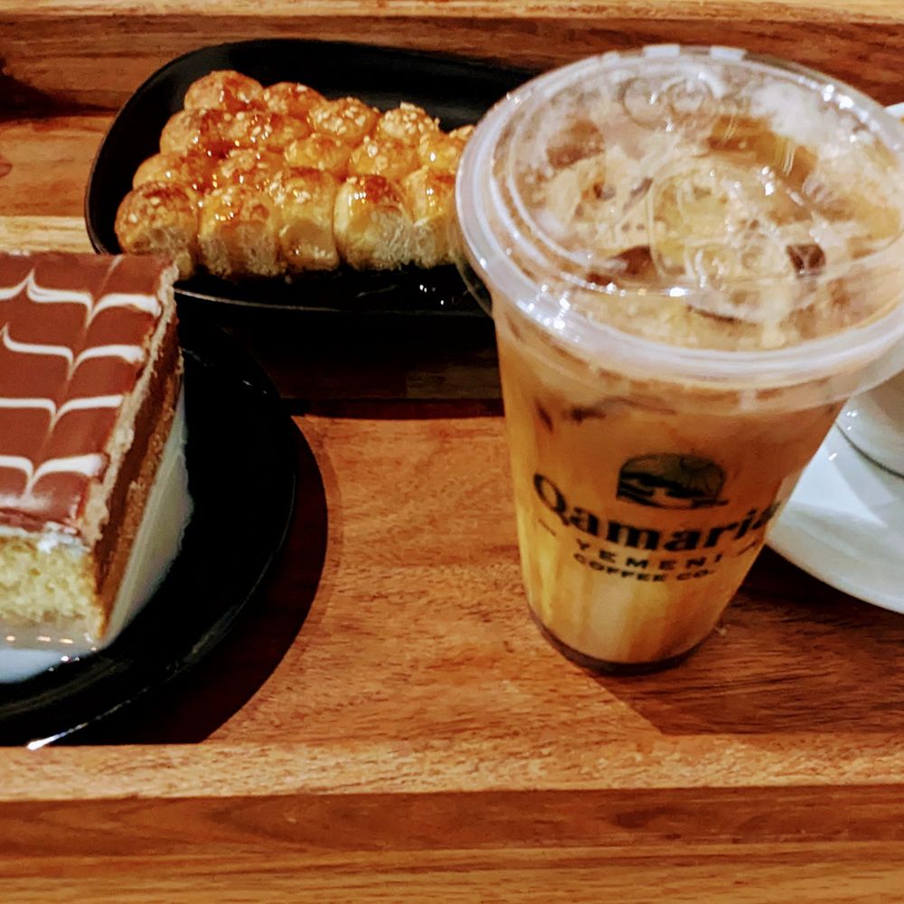 Qamaria Coffee - (L to R): Milk cake, Honeycomb, Iced Qamaria Latte, and Pistachio Latte. - Bakeries Near Me - Hilliard, Ohio Qamaria Coffee - (L to R): Milk cake, Honeycomb, Iced Qamaria Latte, and Pistachio Latte. - Bakeries Near Me - Hilliard, Ohio