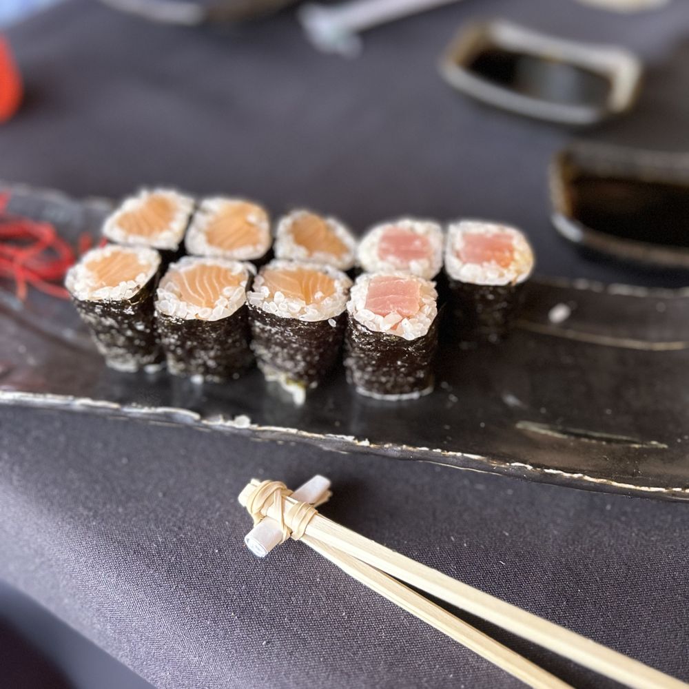 Tuna sushi, salmon sushi, 6 rolls each, some already eaten because I couldn't wait