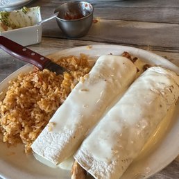 Chicken burrito, guac and grilled chicken entree Chicken burrito, guac and grilled chicken entree