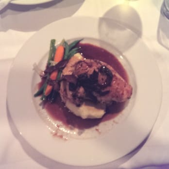 Adega Restaurante - Pan-roasted breast of capon with mushroom herb sauce and market vegetables. - Portuguese Near Me - Toronto, Ontario Adega Restaurante - Pan-roasted breast of capon with mushroom herb sauce and market vegetables. - Portuguese Near Me - Toronto, Ontario