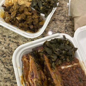Smokey Jay's BBQ - Pork ribs with baked beans and Collard Greens. Beef brisket with Mac N Cheese - Southern Near Me - Orlando, Florida