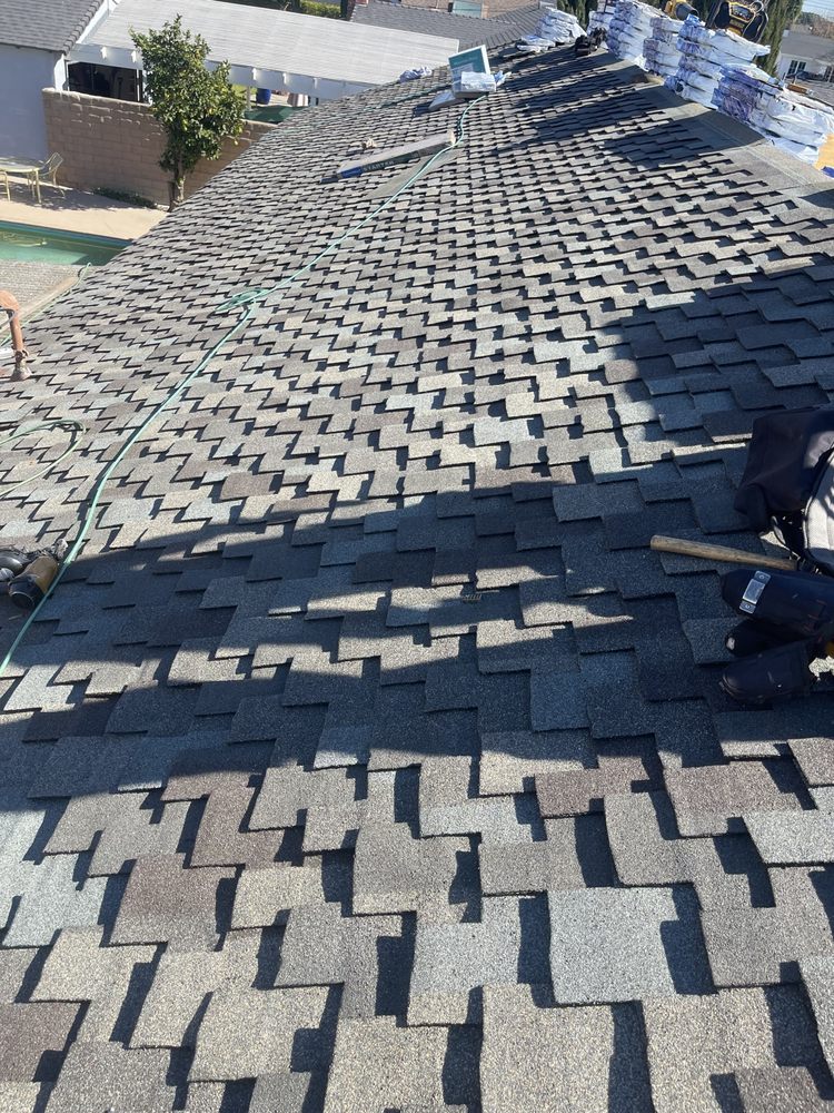 Slide of Pacific Roofing