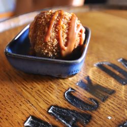 Petrol Head Bar & Grill - Fried Ice Cream. 
Flash fried in a crunchy cornflake crust, finished with our house coffee caramel sauce.