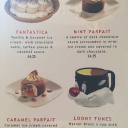 Spices Indian Cuisine - Ahhh they have dessert in a Looney Tunes mug!