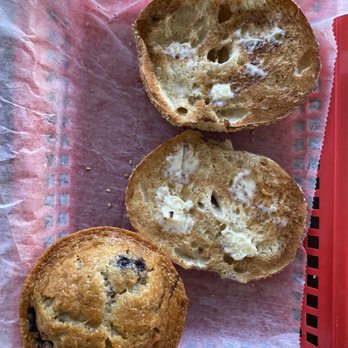 Outrageous Bagel Company - Sesame seed bagel with butter, toasted and a Blueberry muffin. - Bagels Near Me - Miami, Florida Outrageous Bagel Company - Sesame seed bagel with butter, toasted and a Blueberry muffin. - Bagels Near Me - Miami, Florida