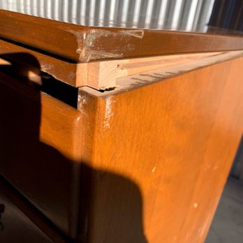 Johnson Storage & Moving - damage caused because of poor packing, lack of protection and leaking truck bay - Self Storage Near Me - Ft. Collins, Colorado