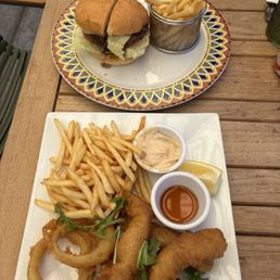 Fish and chips ($18) and burger ($18). Fish and chips ($18) and burger ($18).