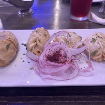 Silk Road Bistro - 4 Piece Manti, 2 beef, 1 potato and 1 pumpkin - Uzbek Near Me - Pikesville, Maryland Silk Road Bistro - 4 Piece Manti, 2 beef, 1 potato and 1 pumpkin - Uzbek Near Me - Pikesville, Maryland