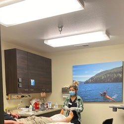 Victoria L Melhuish, DPM - Treatment room with a patient