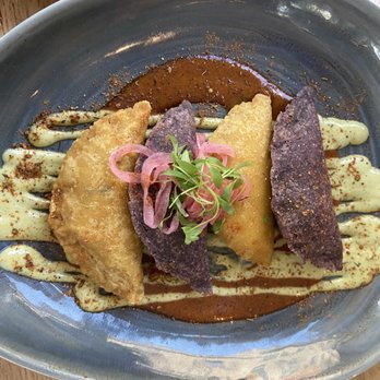 Travieso - Empanadas - alternating flavors for meat, but always include corn - New American Near Me - Waukesha, Wisconsin Travieso - Empanadas - alternating flavors for meat, but always include corn - New American Near Me - Waukesha, Wisconsin