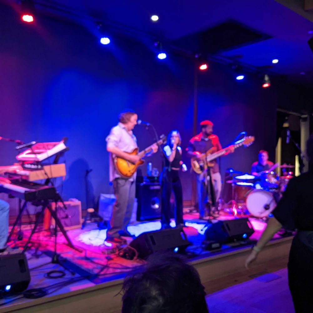 Magic Rat - a band performing on stage at a concert - Bars Near Me - Fort Collins, Colorado