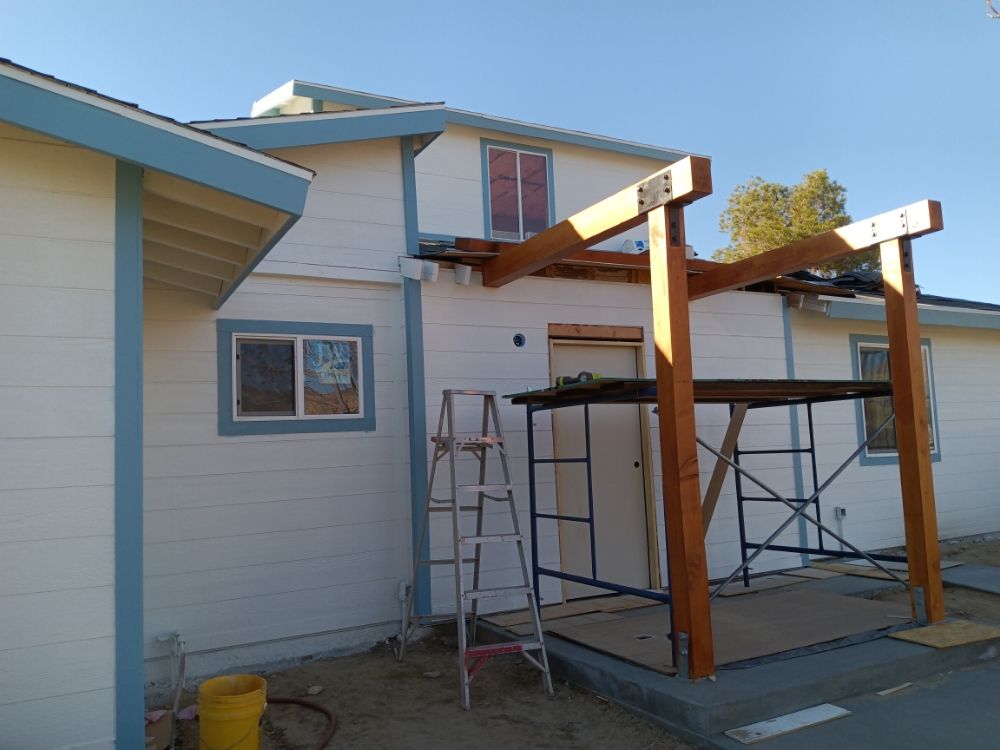 Slide of Moses Roofing