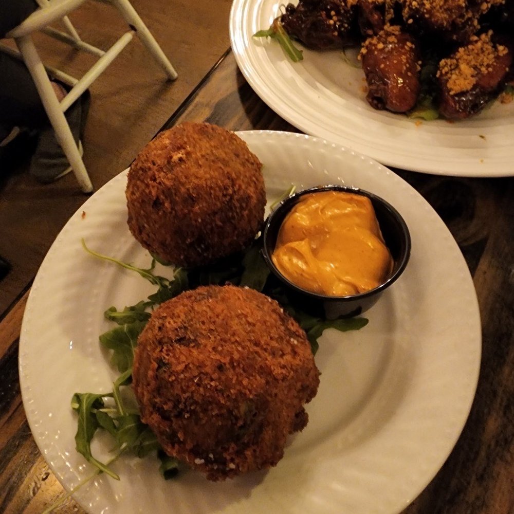 Hermanas Kitchen and Cocktails - Pernil rice balls - Cocktail Bars Near Me - Lindenhurst, New York Hermanas Kitchen and Cocktails - Pernil rice balls - Cocktail Bars Near Me - Lindenhurst, New York