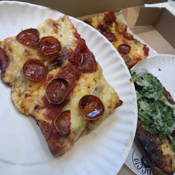 Fuccio - two slices of pizza on a paper plate - Pizza Near Me - Brooklyn, New York