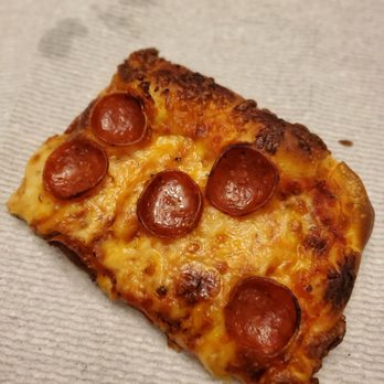 Favorite's Pizzeria - a slice of pepperoni pizza - Pizza Near Me - Amherst, New York