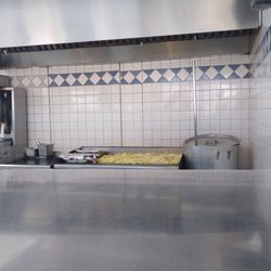 Tacos Taqueria - The chopped Potatoes are about the get fried! Zoom the pic.