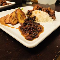 Fuel your body and soul with this hearty plate of white rice, Cuban-style black beans, and tender chicken.