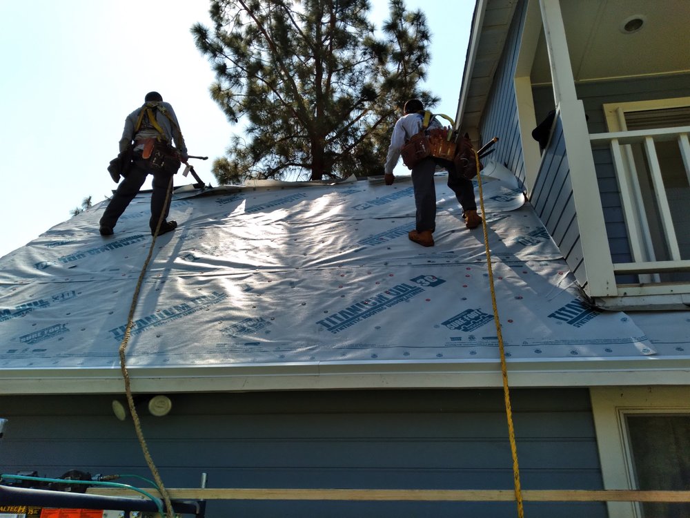 Slide of RM Roofing